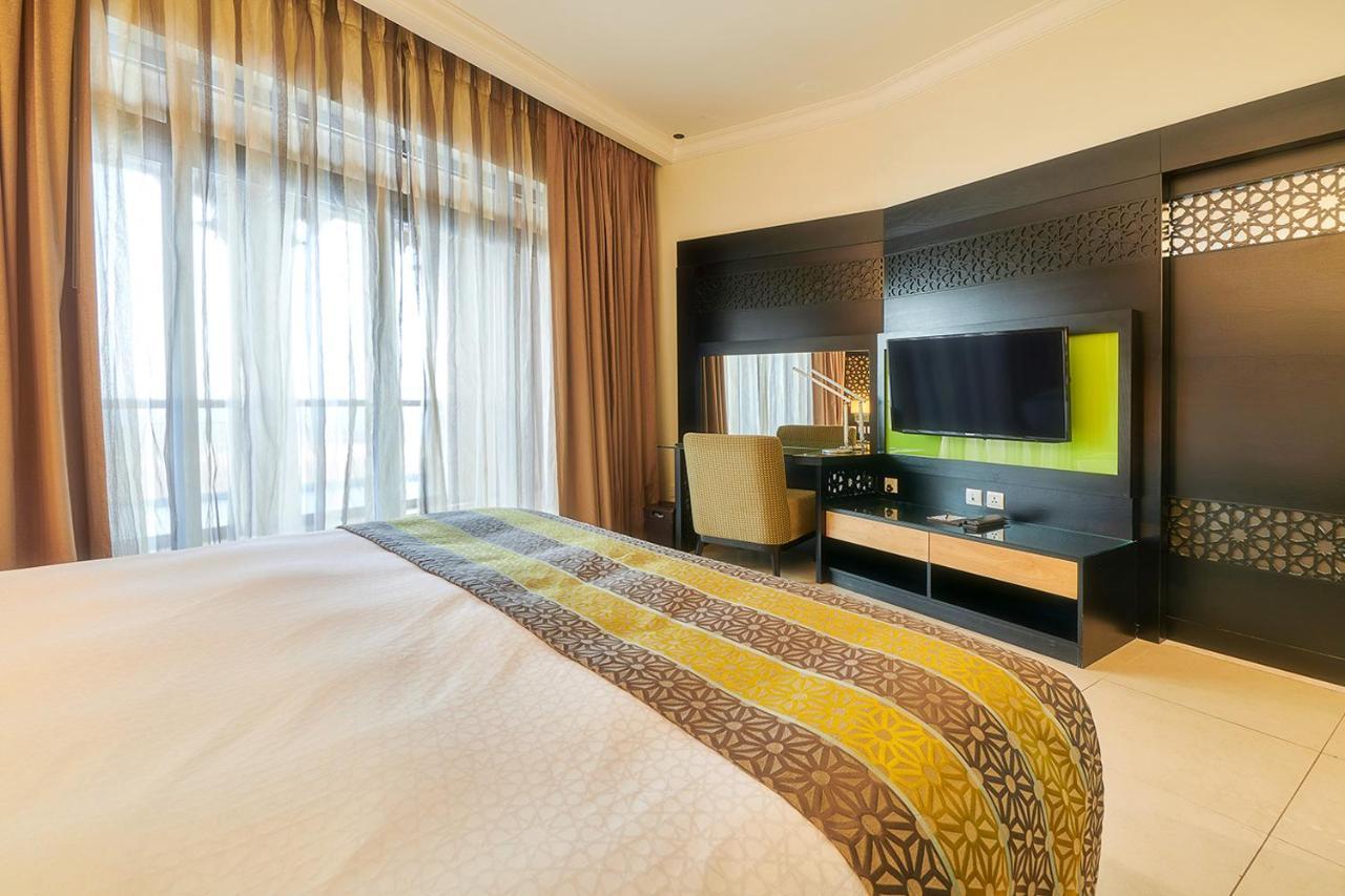 巴希阿治曼宫酒店 阿吉曼 外观 照片 A bedroom at the hotel