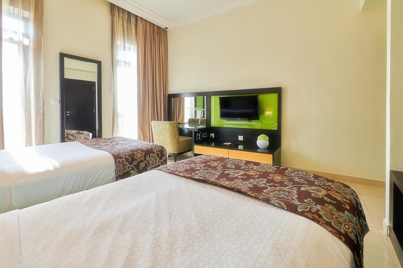 巴希阿治曼宫酒店 阿吉曼 外观 照片 A room at the hotel