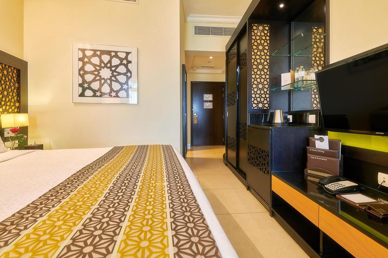 巴希阿治曼宫酒店 阿吉曼 外观 照片 A room at the hotel
